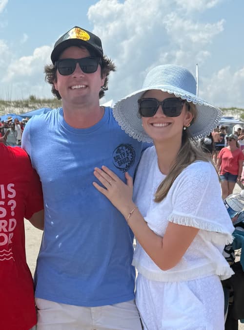Alec Pucci, the founder of Florida Roofing and Restoration as he happily stands on a Northeast Florida beach.